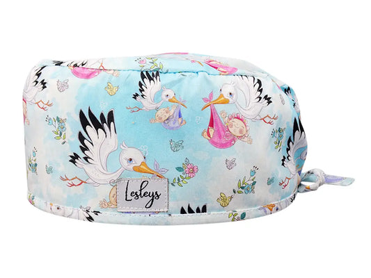 Stoff OP Haube aus Baumwolle Klapperstorch. Bunte OP Muetze fuer Damen und Herren
