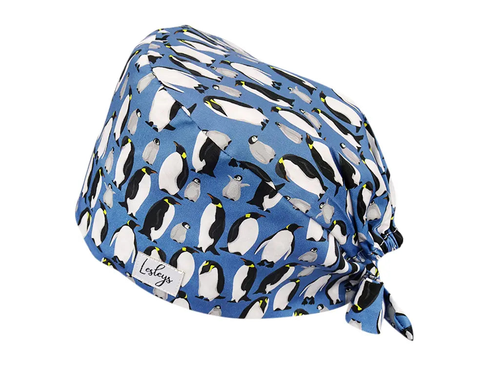 Stoff OP Haube aus Baumwolle Pinguine. Bunte OP Muetze fuer Damen und Herren