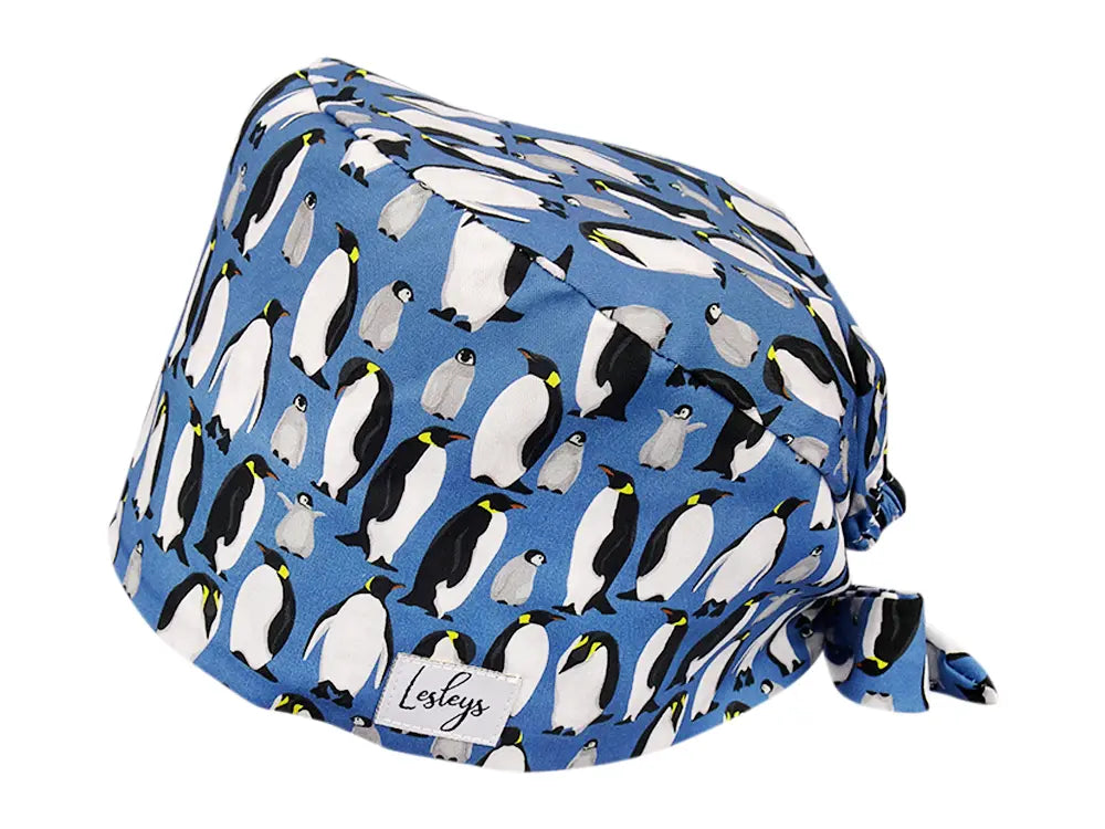 Stoff OP Haube aus Baumwolle Pinguine. Bunte OP Muetze fuer Damen und Herren